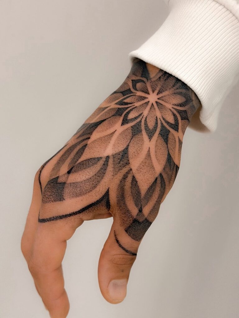 geometric hand tattoo